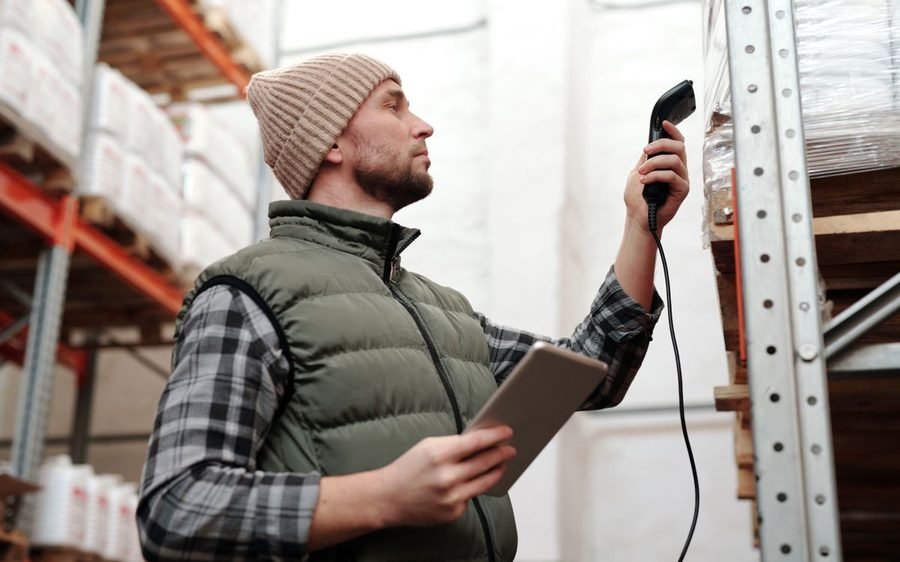 Warehouse operative scanning stock, a process well suited to automation